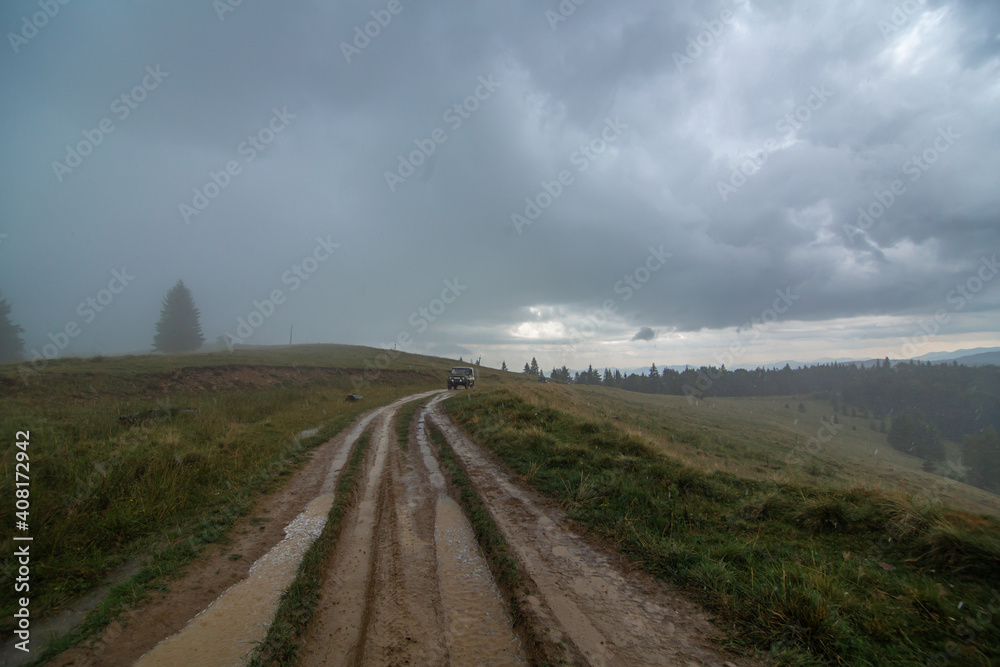 Car tour on mountains durring rainfall bad weather day Car tour on mountains durring rainfall bad weather day