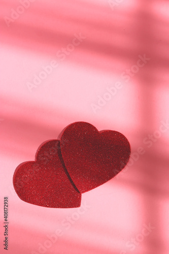 Abstract heart shape on the pink background. Holiday and love concept.