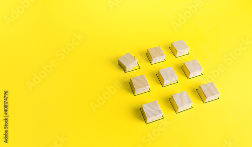 The blocks are in the correct order except for one. Violation of order, malfunction failure. Deviation from the norm. Determination and correction of the error. Disorder process. Discipline staggered