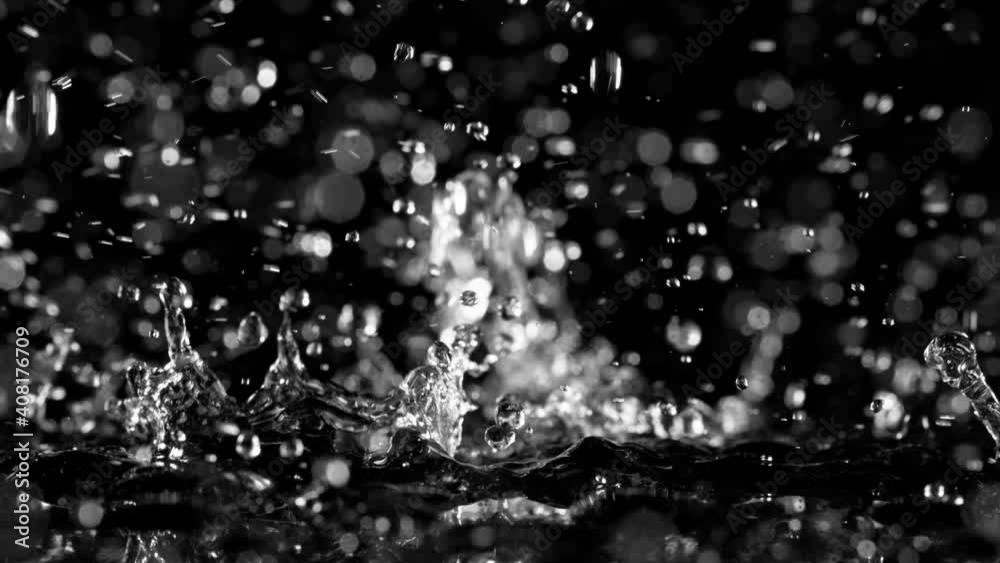 Super slow motion of splashing water drops, filmed on macro lens. Filmed on very high speed camera, 1000 fps. Super slow motion of splashing water drops, filmed on macro lens. Filmed on very high speed camera, 1000 fps.