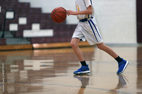 basketball dribble by a young man