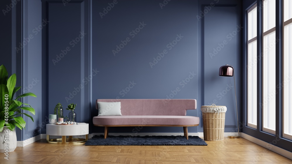 Interior of light room with sofa on empty dark blue wall background. Interior of light room with sofa on empty dark blue wall background.
