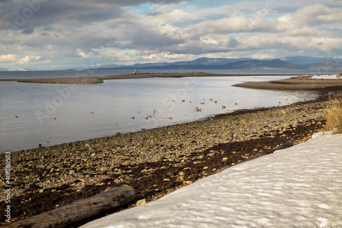 Parksville community beach in winter with snow, Vancouver Island
