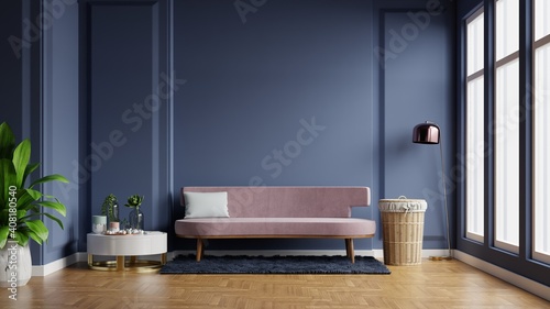 Fototapeta Naklejka Na Ścianę i Meble -  Interior of light room with sofa on empty dark blue wall background.