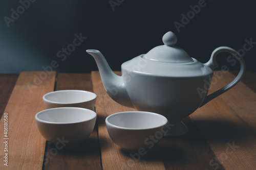 Empty coffee and tea cup suit on the wooden background