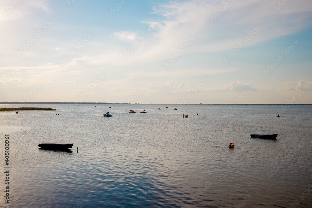 Fototapeta premium Fishing boat on the shore on lake