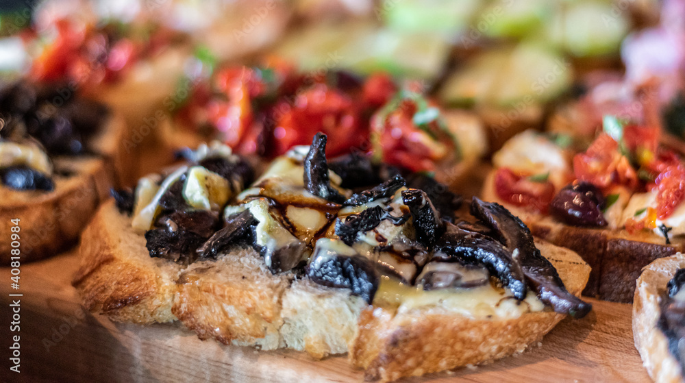 Traditional bruschetta platters with assorted toppings Traditional bruschetta platters with assorted toppings