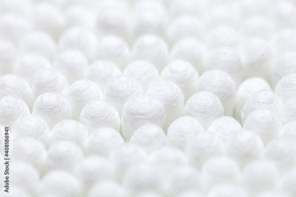 Lot of cotton swabs close-up. Background texture. Selected focus Lot of cotton swabs close-up. Background texture. Selected focus
