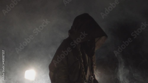 Sect. people in black coats. rite, cult