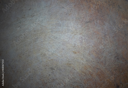 Dark scratched wooden cutting board. Wood texture
