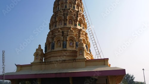 Drone footage of the colorful Malganga Hindu Temple at Nighoj near Pune India. photo