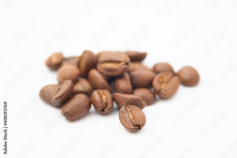 Bean coffee in isolated white background. Medium roasted coffee beans are light brown in color in white background. Bean coffee in isolated white background. Medium roasted coffee beans are light brown in color in white background.