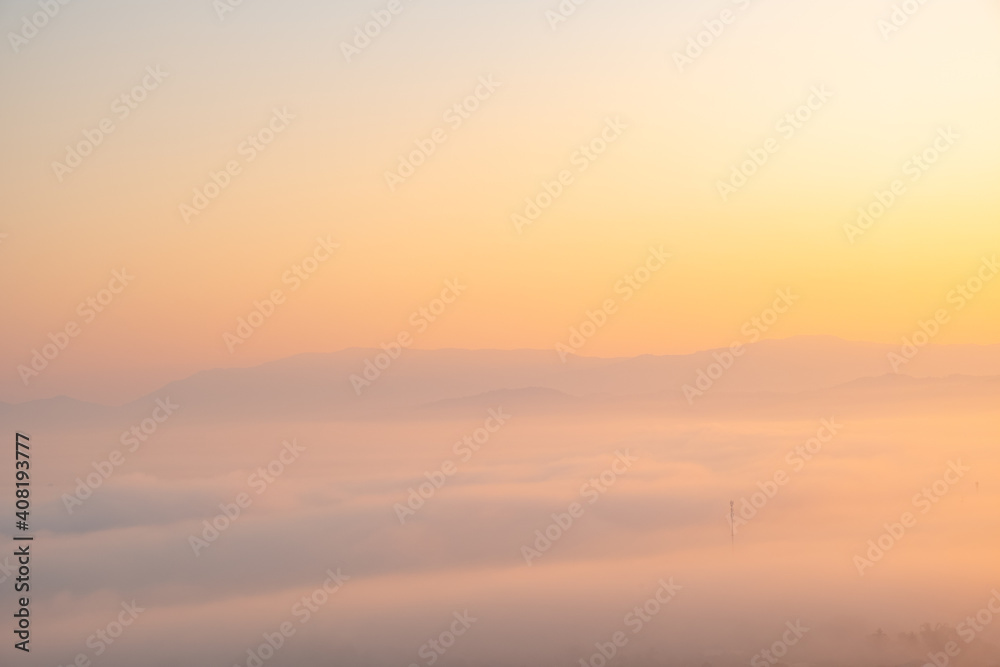 Surreal landscape of morning foggy..Morning clouds at sunrise.Landscape of fog and mountains of northern Thailand.