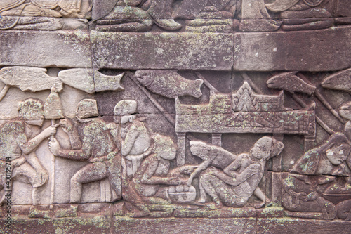 Bayon the central temple of Angkor Thom  late 12th century. Bas-relief. It rains in the rainy season.  Cambodia  04.10. 2019 