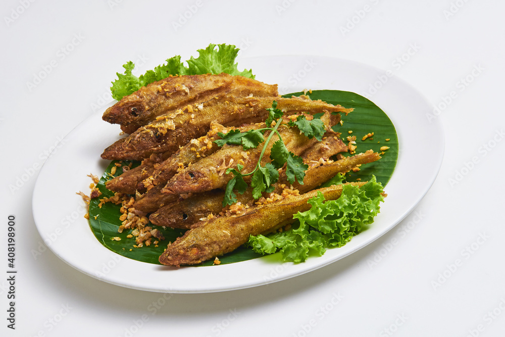 Fried Fish with Garlic and Turmeric Crispy Popular Thai dishes Fried Fish with Garlic and Turmeric Crispy Popular Thai dishes
