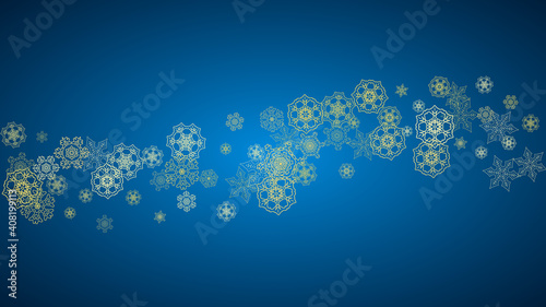New Year snow on blue background. Gold glitter snowflakes. Christmas and New Year snow falling backdrop. For season sales  special offers  banner  cards  party invite  flyer. Horizontal frosty winter.