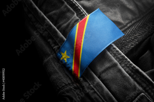 Tag on dark clothing in the form of the flag of the Democratic Republic of the Congo