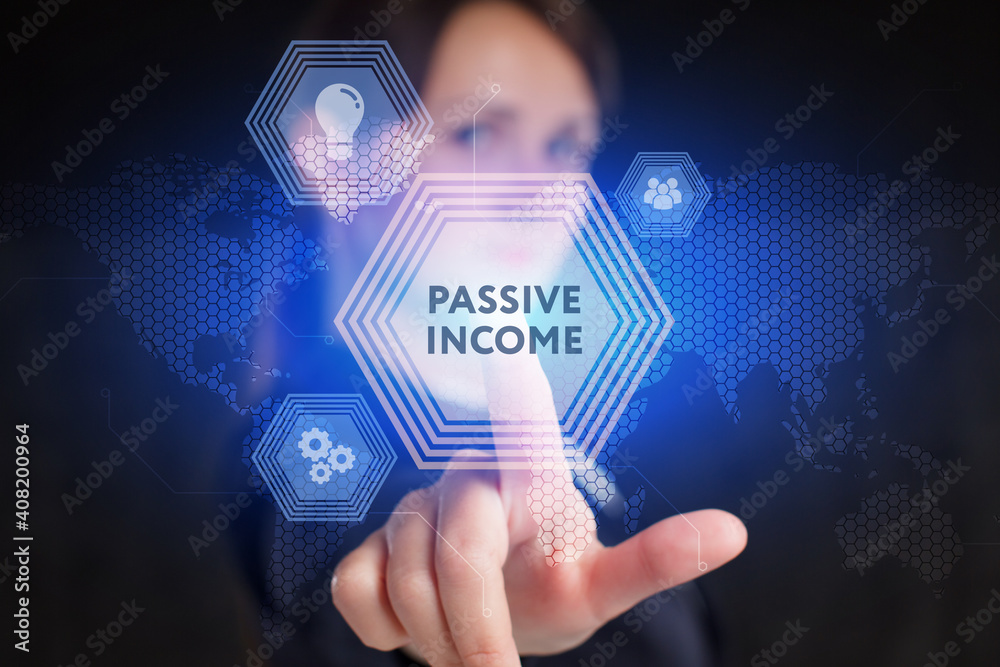Business, Technology, Internet and network concept. Young businessman working on a virtual screen of the future and sees the inscription: Passive income Business, Technology, Internet and network concept. Young businessman working on a virtual screen of the future and sees the inscription: Passive income