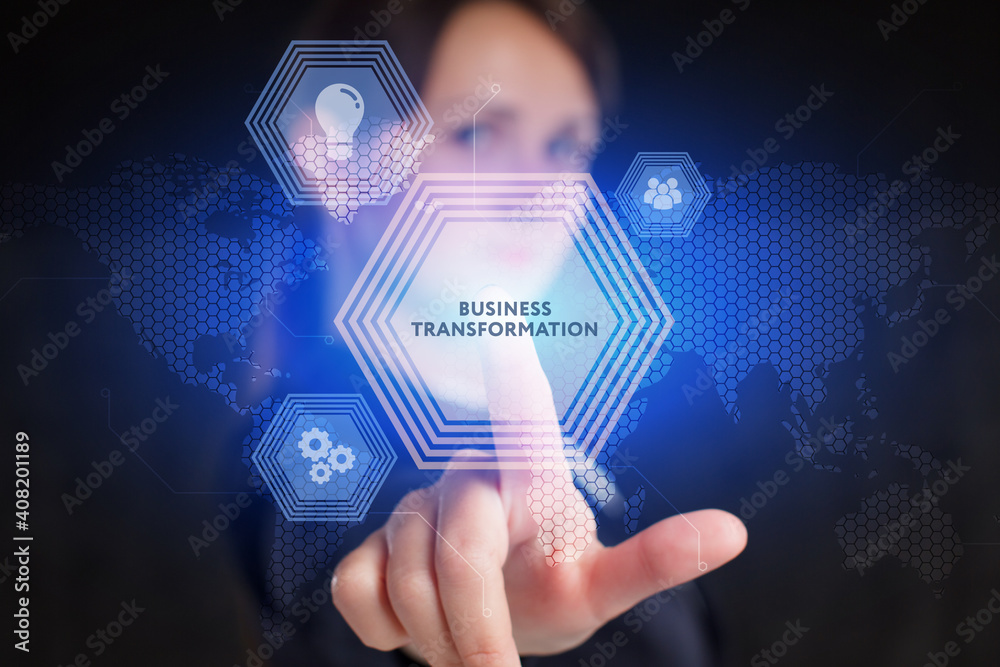 Business, Technology, Internet and network concept. Young businessman working on a virtual screen of the future and sees the inscription: Business transformation Business, Technology, Internet and network concept. Young businessman working on a virtual screen of the future and sees the inscription: Business transformation