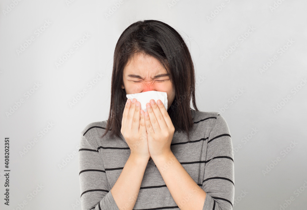young asian woman sneeze feel sick young asian woman sneeze feel sick
