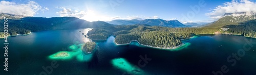 360 Panoramic aerial view of Eibsee lake by Zugspitze in Germany summer before sunset
