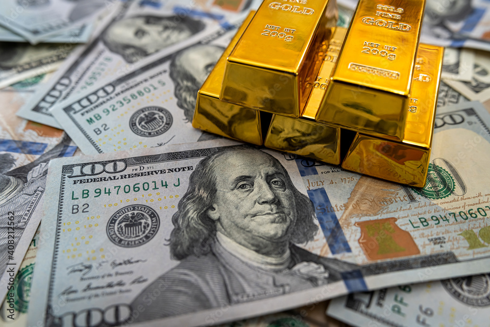 gold bars on american dollar bills gold bars on american dollar bills