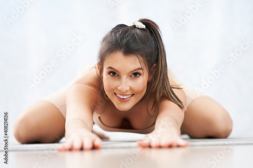 Adult woman working out at home