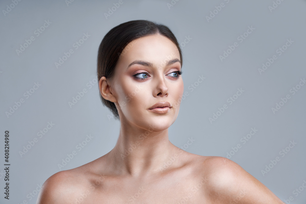Portrait of beautiful woman on gray background Portrait of beautiful woman on gray background