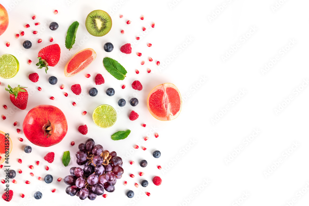 Fresh fruit, shot from the top on a white background, a flat lay with copy space Fresh fruit, shot from the top on a white background, a flat lay with copy space