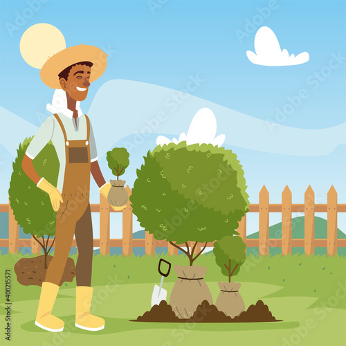 gardening, man with shovel working in the garden and digs ground