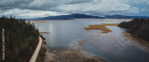 Aerial drone view of portion of Cerknisko jezero or Cerknica lake, famous lake in Slovenia, during late autumn time, when the lake is full of water. Looking towards Slivnica.