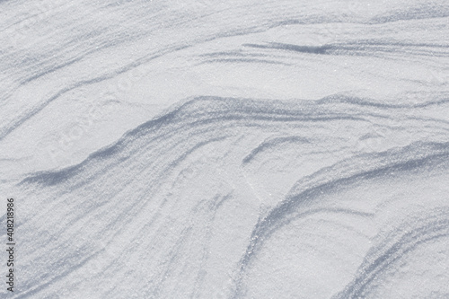 Natural snowy background. Natural snowy surface.