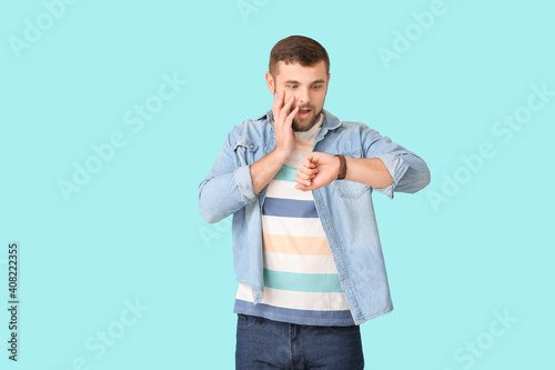 Stressed man looking at wri...