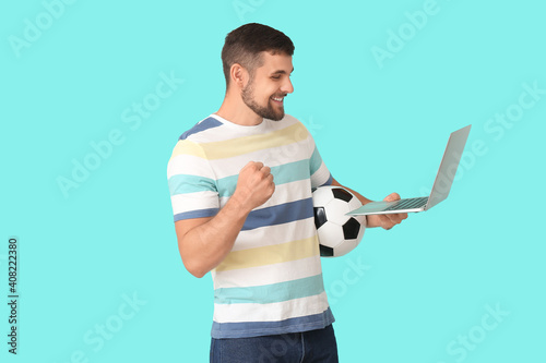 Young man with soccer ball ...