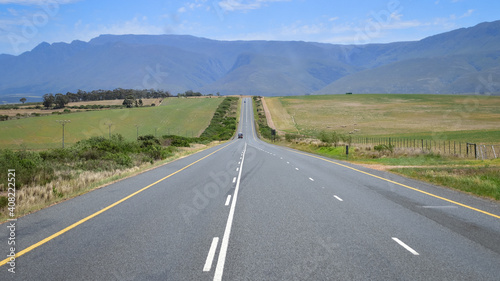 Road in scenic countryside landscape, driving trip to Cape Town, highway in South Africa