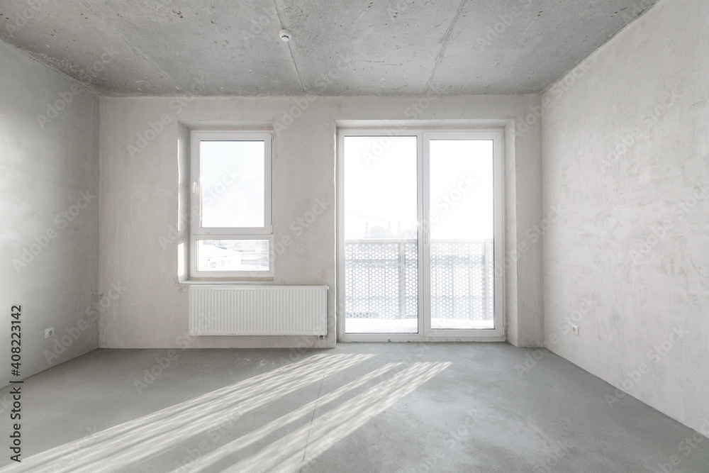 Fototapeta premium interior of the apartment without decoration in gray colors