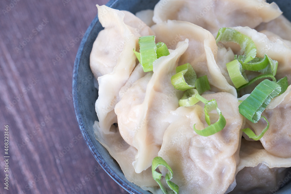 Close up cooked dumplings with white flour Close up cooked dumplings with white flour
