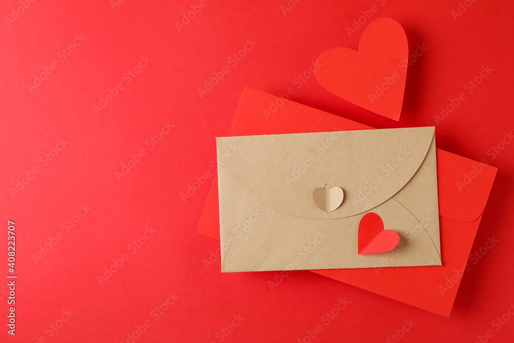 Envelopes and hearts on red background, space for text Envelopes and hearts on red background, space for text
