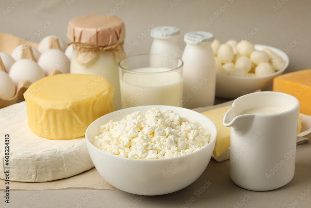 Different fresh dairy products on gray background Different fresh dairy products on gray background
