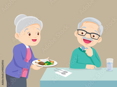 Lovely grandmother serving food to grandfather