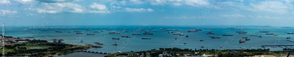 Fototapeta premium Ships waiting in Singapore harbor during COVID pandemic lockdown