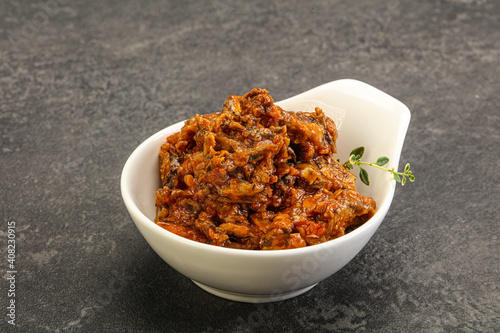 Canned anchovy in tomato sauce
