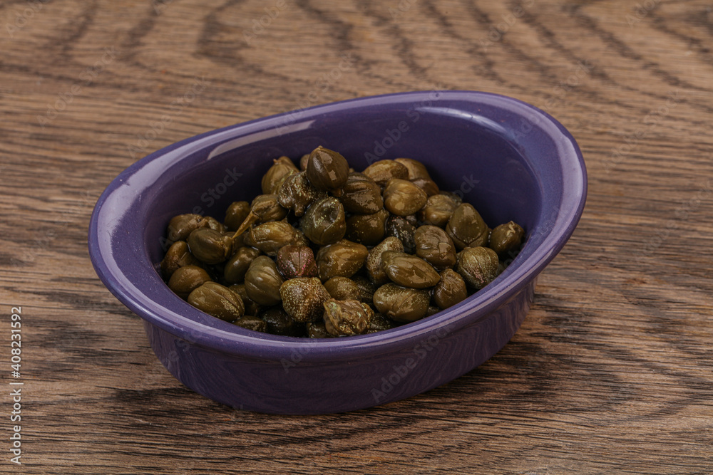 Tasty capers in the bowl Tasty capers in the bowl
