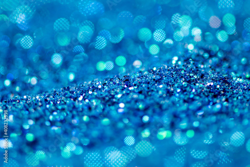 abstract of bright and sparkling bokeh background, blue and silver bokeh, soft focus