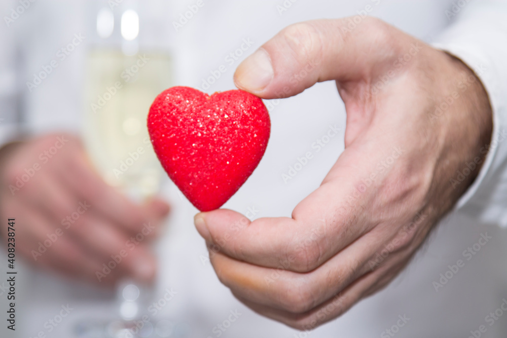 celebration of February 14 Valentine's Day with champagne and heart in hand