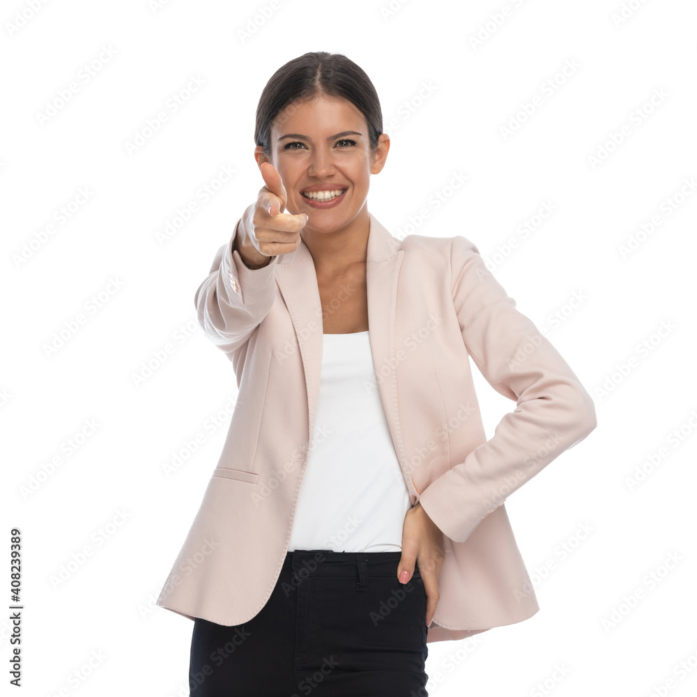 happy businesswoman pointing fingers and smiling happy businesswoman pointing fingers and smiling