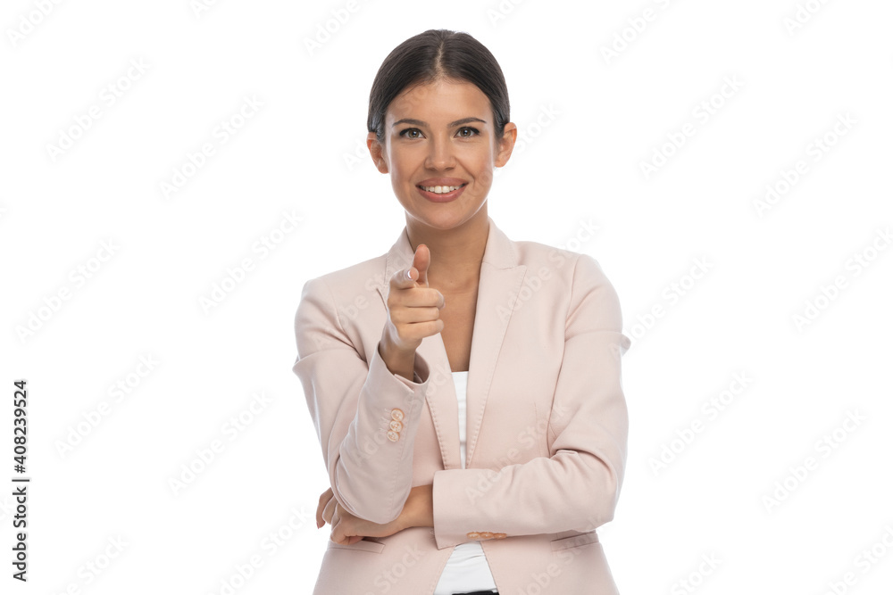 smiling smart casual girl crossing arms and pointing fingers smiling smart casual girl crossing arms and pointing fingers