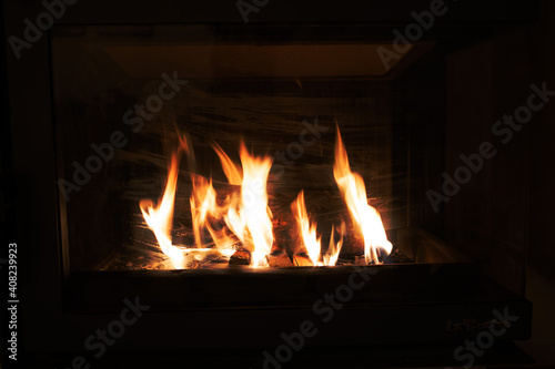 hot fire burning in a domestic fireplace on a winter day