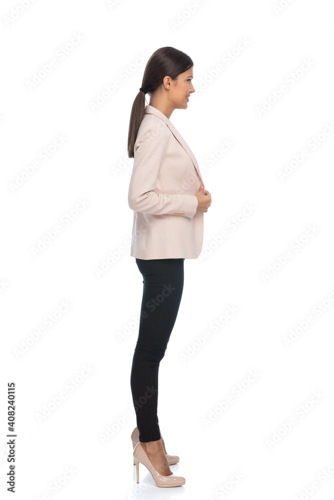 happy businesswoman in pink jacket waiting in line and smiling happy businesswoman in pink jacket waiting in line and smiling