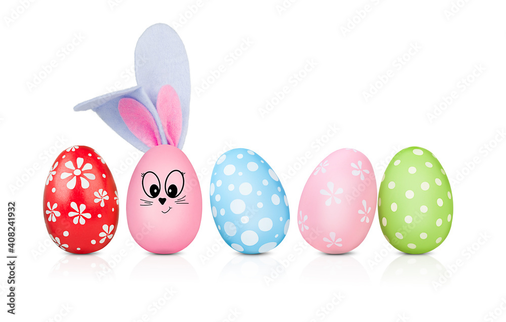 five multicolored decorated Easter eggs on isolated white background